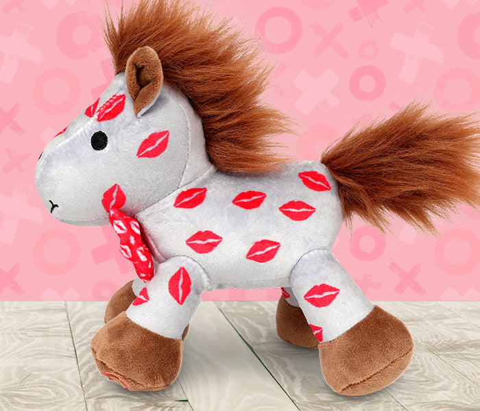 Smooch | 2025 Valentine's Day Plush on a pink background facing left