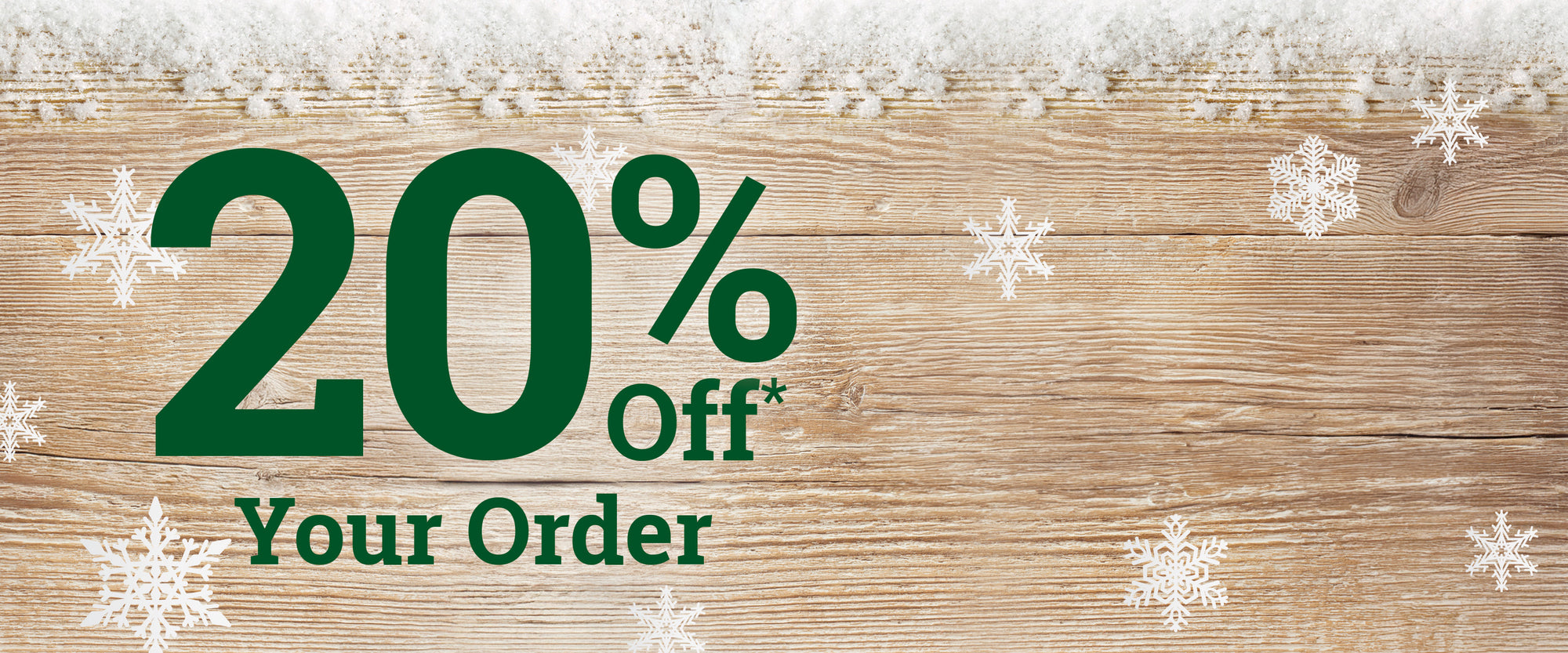 Save 20% for a limited time* on a wooden background