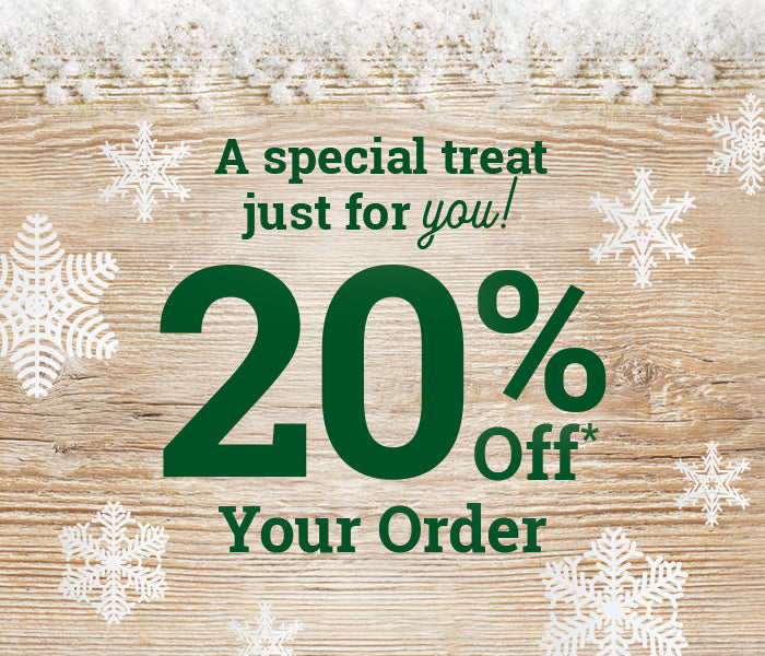 Save 20% off your order* On wooden background with snowflakes