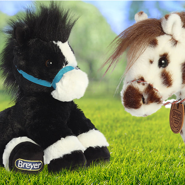 Plush Toys - two shown in a grassy field