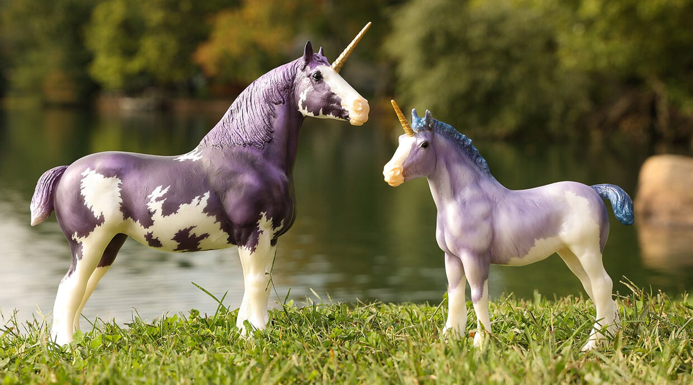 Hyacinth and Wisteria Unicorns in a field