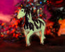 Draftula | 2024 Freedom Series Halloween Horse in a Halloween scene and glowing, facing slightly to the left