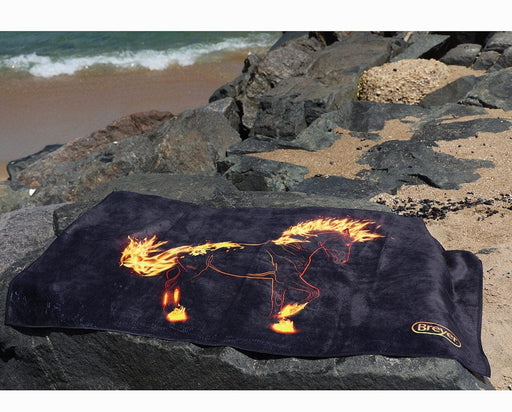 Fireheart Beach & Bath Towel on a jetty