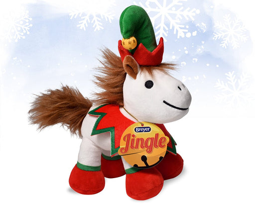 Jingle | 2024 Holiday Plush shown with it's tag on a snow background