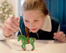 A girl painting the Paint Your Horse | Ornament Craft Kit