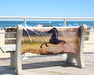 Quarter Horse Beach & Bath Towel on a bench