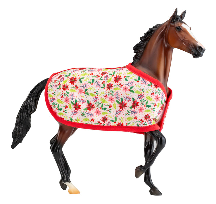 Traditional Holiday Horse Blanket; brown horse wearing blanket with poinsettia print with red trim