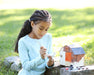 A girl painting the Horse & Barn Paint & Play