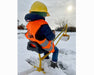 The Big Dig in the snow with a child wearing a Big Dig helmet and vest 